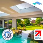 Dining area lit by a Skyseal flat roof skylight, with garden view