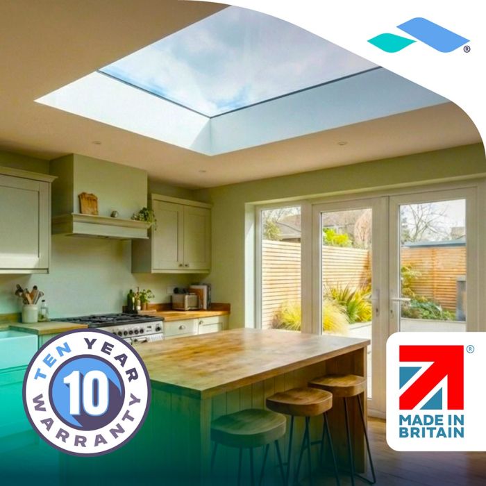 Kitchen and dining area lit by a Skyseal flat glass rooflight
